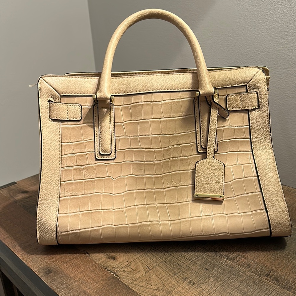 Cream colored-embossed Faux leather handbag